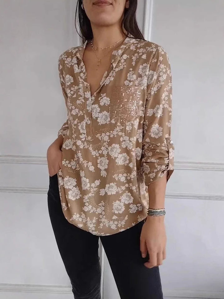 Dame blouse top med blomstermønster og glitrende pailletter Stilla