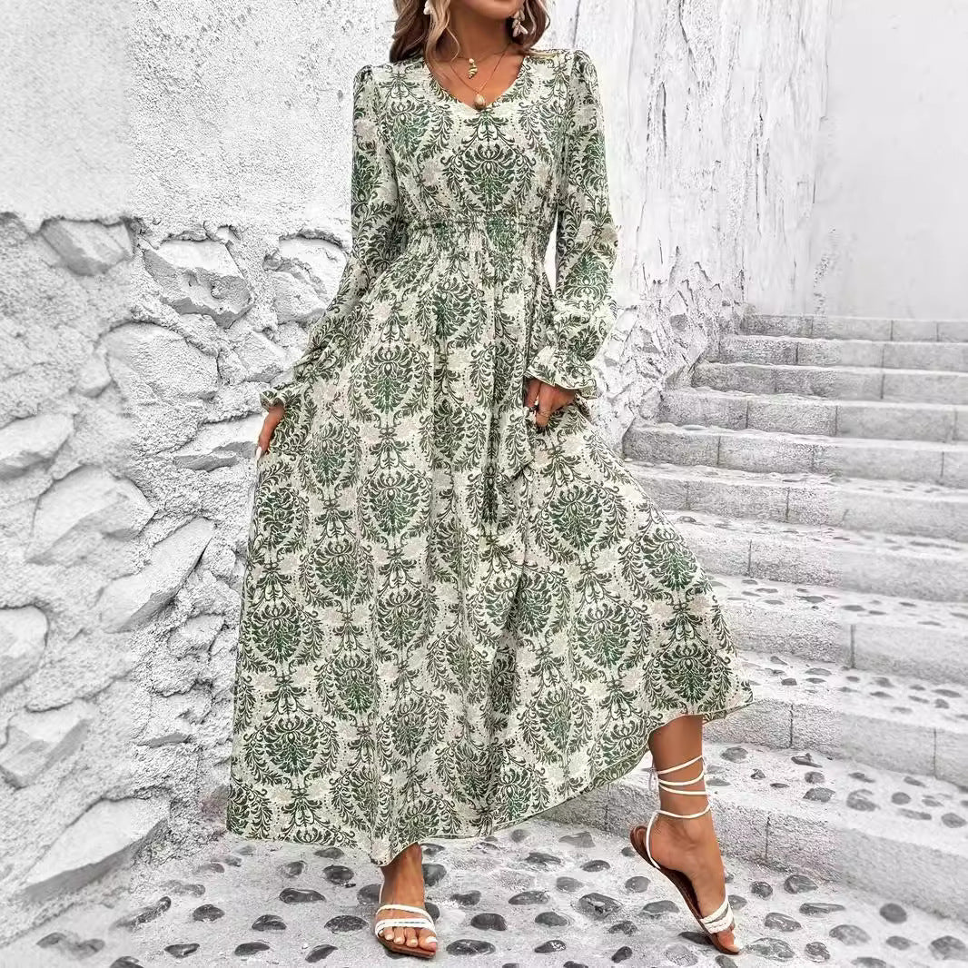 Dame Maxikjole med floralt design og vidde skørt Stilla
