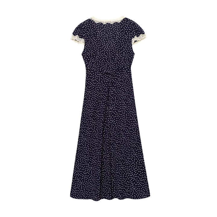 Femme Elegant Udvidet Polka Dot Maxi Kjole med Spids Detalje Stilla