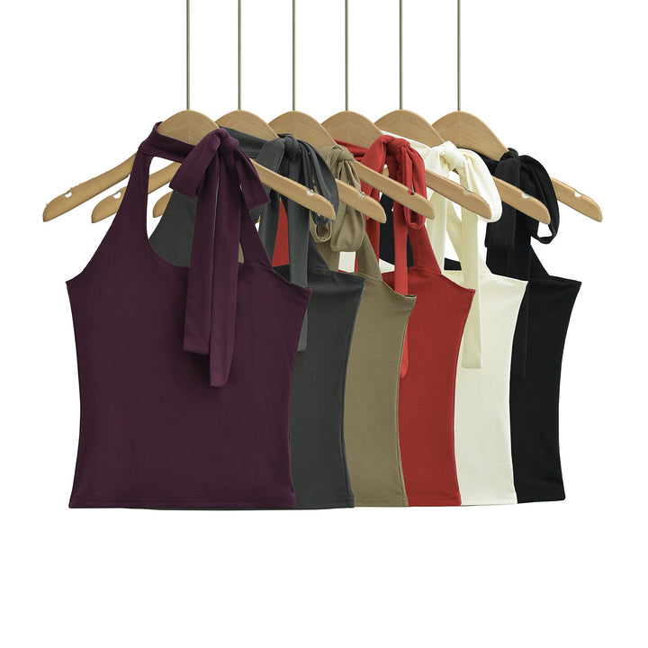 Dame asymmetrisk halterneck top med elegant sløjfe og charmerende snit Stilla