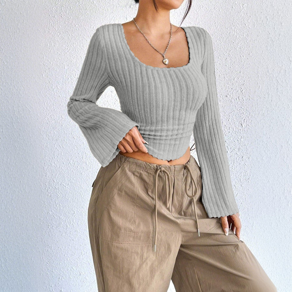 Kvinders langærmet crop top med dekorativ ribdesignet og afrundet bund Stilla