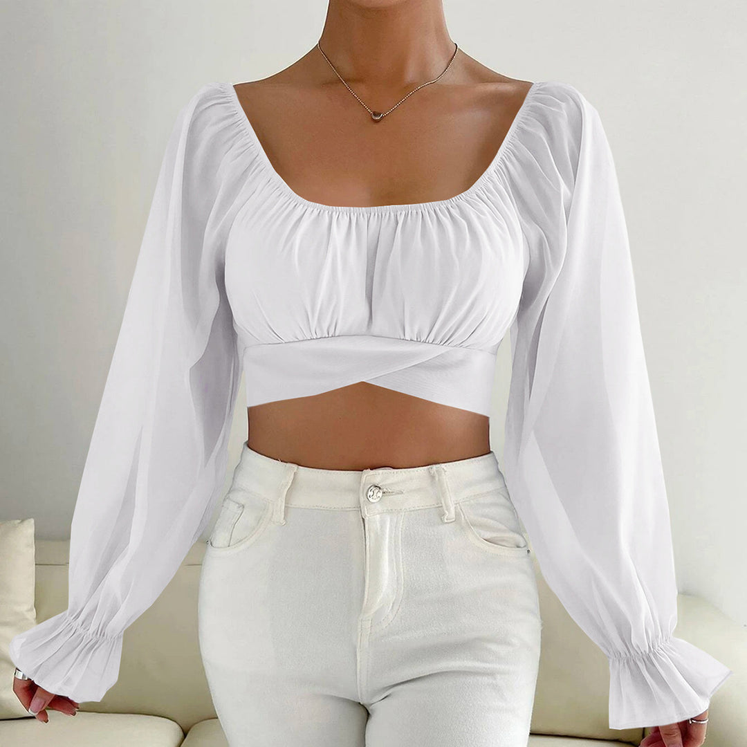 Damer cropped bluse med puffærmer og raffineret snit Skovae