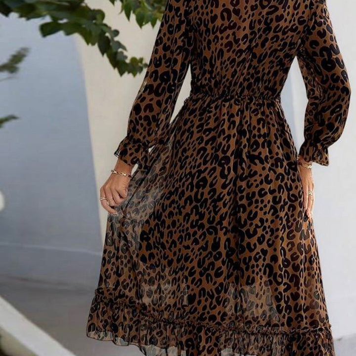 Kvindernes maxikjole med elegant leopardmønster og voluminøse ærmer