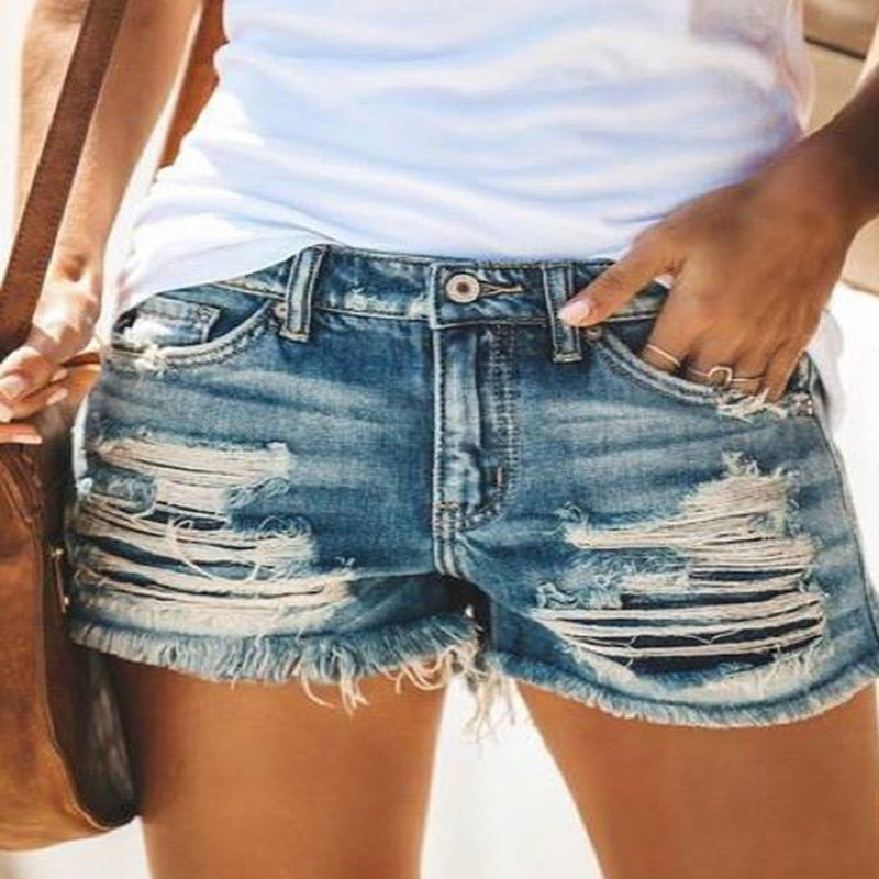 Dame trendy Destroyed Denim-shorts med frynsede kanter og fashionable huldetaljer Skovae