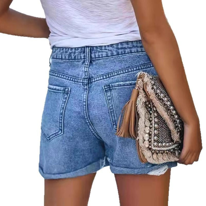 Dame jeansshorts med moderigtige revner og omviklet kant Stilla