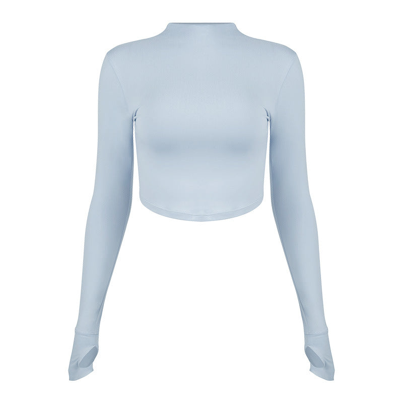 Dame sporty langærmet crop top med høj krave og åndbar struktur Stilla
