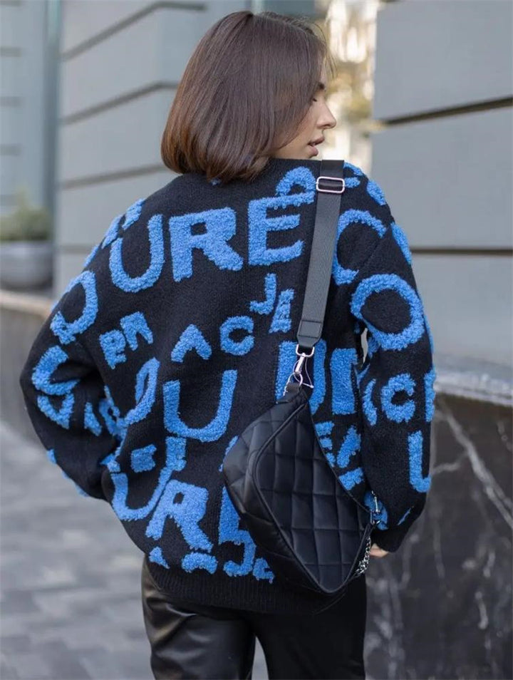 Dame Oversized Strikpullover med iøjnefaldende skrift og afslappet pasform Stilla