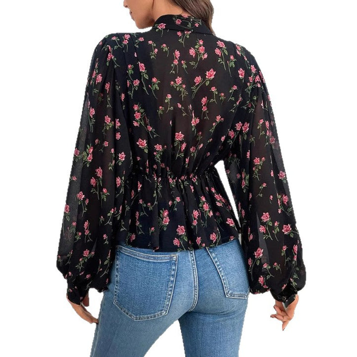 Dame blomsterprintet bluse med puffærmer Stilla