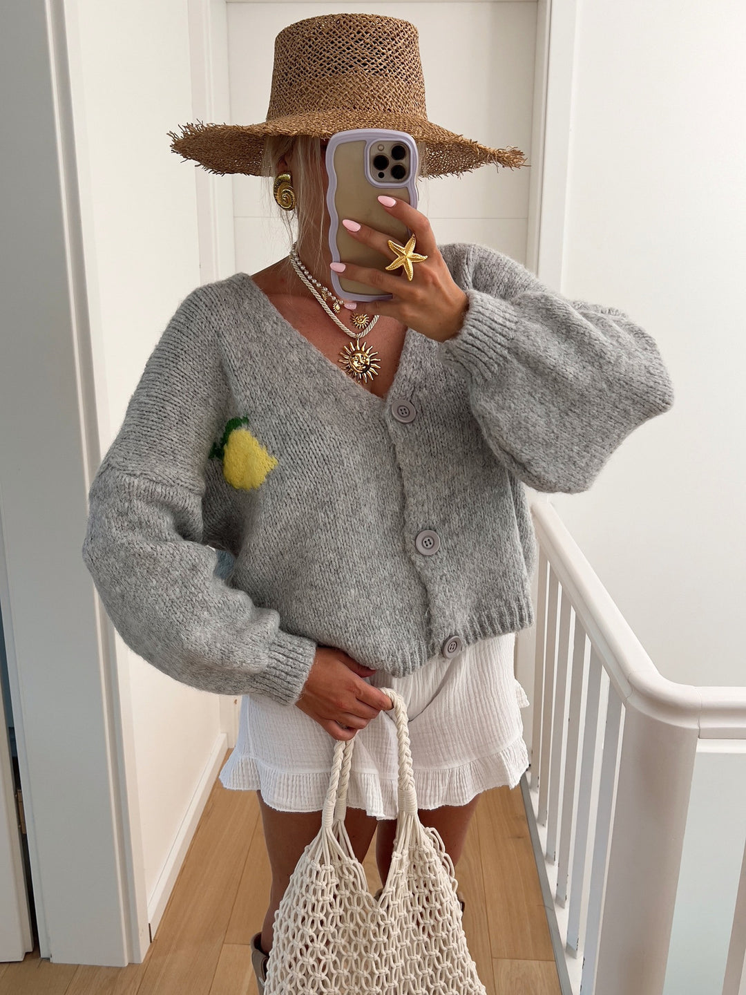 Dame strikjakke med muntert citrondesign og oversized snit Stilla