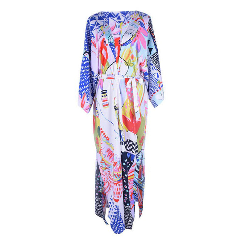 Dame trendy strandkimono med dybe sideslidser og farverigt mønster Stilla