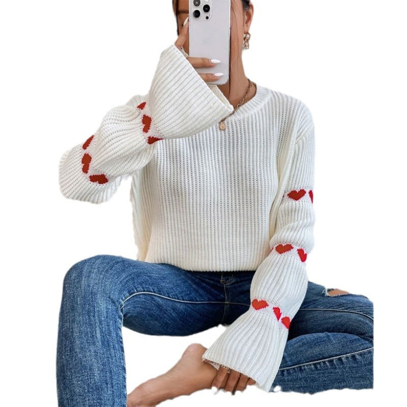 Kvinders strikket sweater med hjerteapplikationer og brede ærmer Stilla