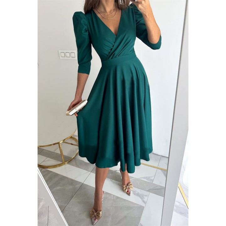 Femme Elegantes Fit-and-Flare Midi Kjole med Pufærmer Stilla