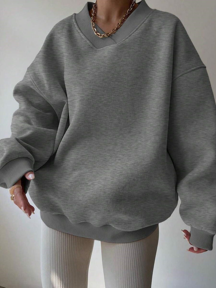 Kvindernes oversized sweatshirt med V-hals og brede ærmer Skovae