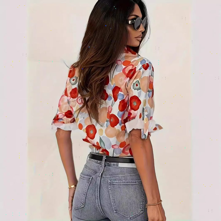 Damebluse med farverigt blomsterprint Stilla