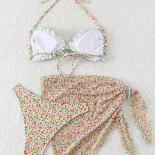 Dame triangel-bikini med floralt omslagsskørt Stilla