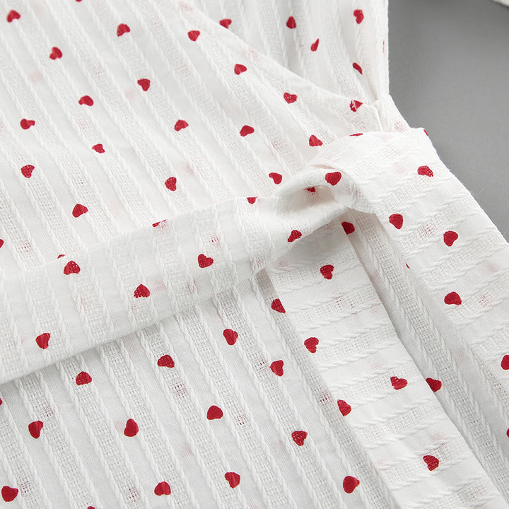 Dame omslagskjole med voluminøse ærmer og trendy polka-prikker Stilla
