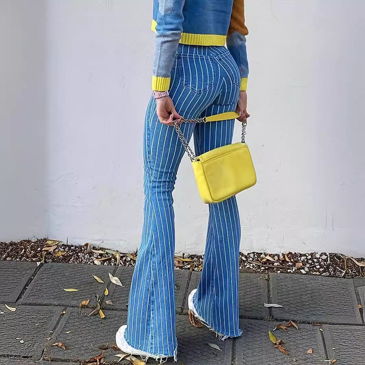 Dame slagjeans i trendy stribedesign med høj talje og frynset kant Stilla