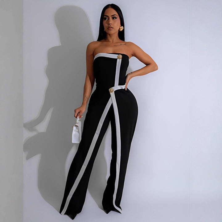 Dame-jumpsuit med elegant bustier-overdel og kontrasterende kantdetaljer Skovae