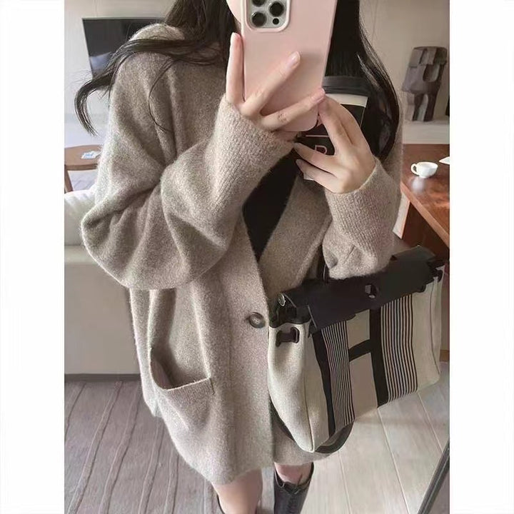 Dame Cozy Cardigan med en Løs Pasform og Lommer