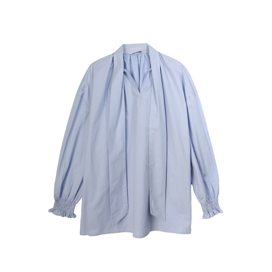 Dame Oversized Bluse med gennemgående indpakningsdesign og elegante detaljer Stilla
