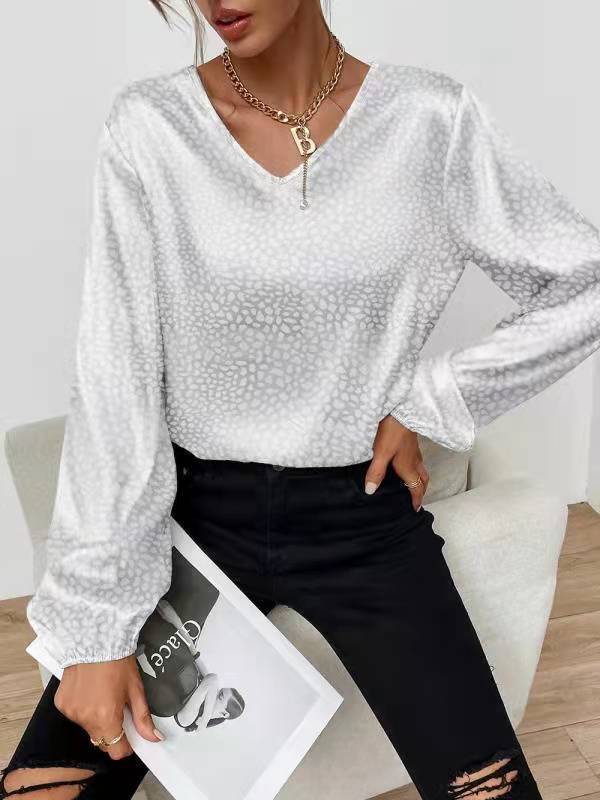 Kvinders elegante bluse top med V-hals og voluminøse ærmer Stilla