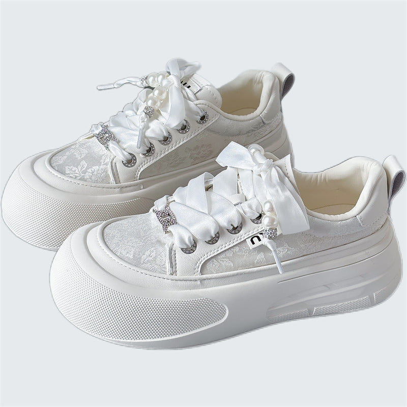 Dame mode-sneakers med dekorative satinbånd og slidstærkt designer-overmateriale Stilla