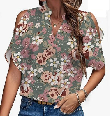 Damebluse med skulderfri detaljer og blomstret mønster Stilla