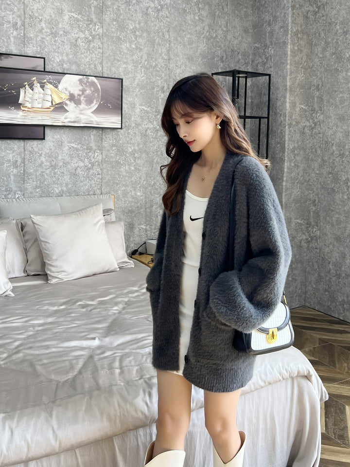 Dame fluffy cardigan med lommer og brede revers Stilla