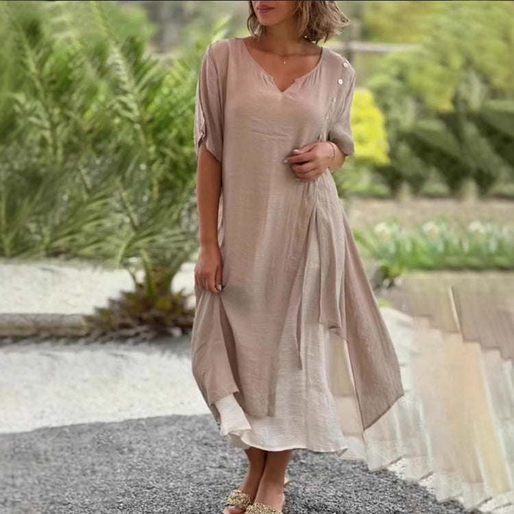 Dame Strandkjole med asymmetrisk snit og elegante knapdetaljer Stilla