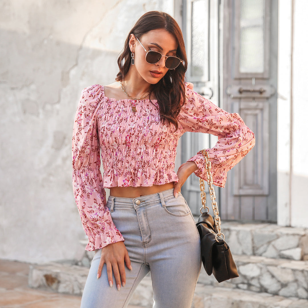 Damebluse med voluminøse ærmer og blomsterprint Stilla