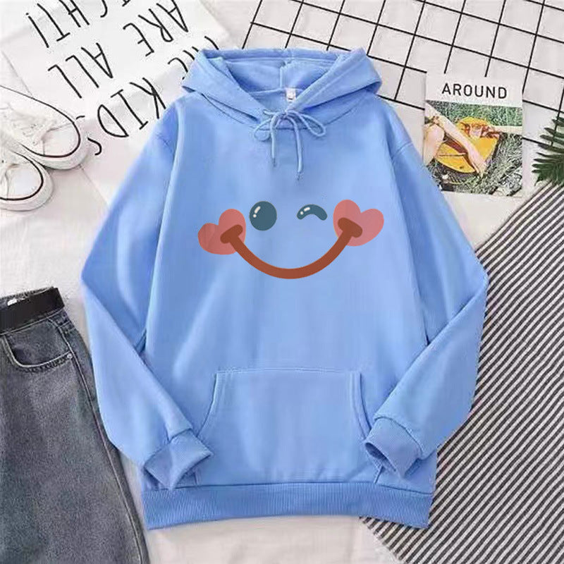 Kvinders hoodie med glad smiley-design Skovae
