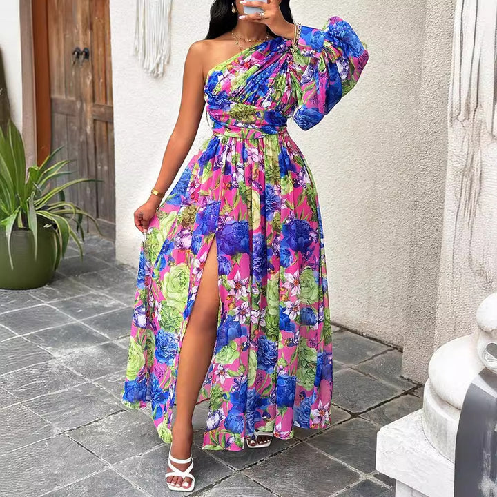 Dame maxikjole med asymmetrisk snit og blomstret design Stilla