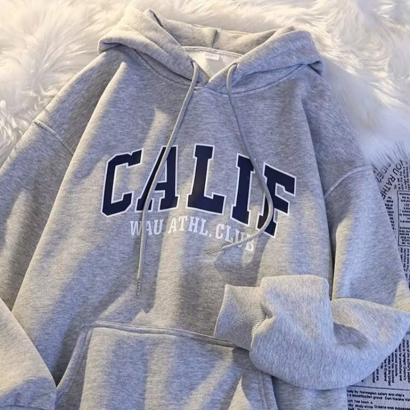 Dame hoodie med moderne sportsdesign Skovae