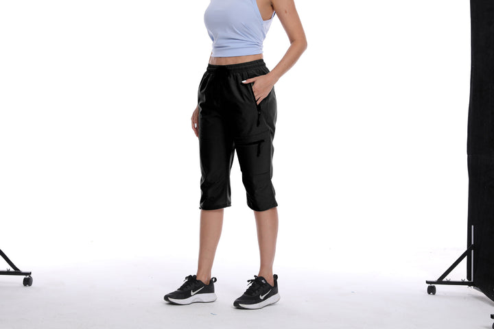 Dame Funktionelle Sports Capri Bukser med Praktiske Lynlåslommer Stilla
