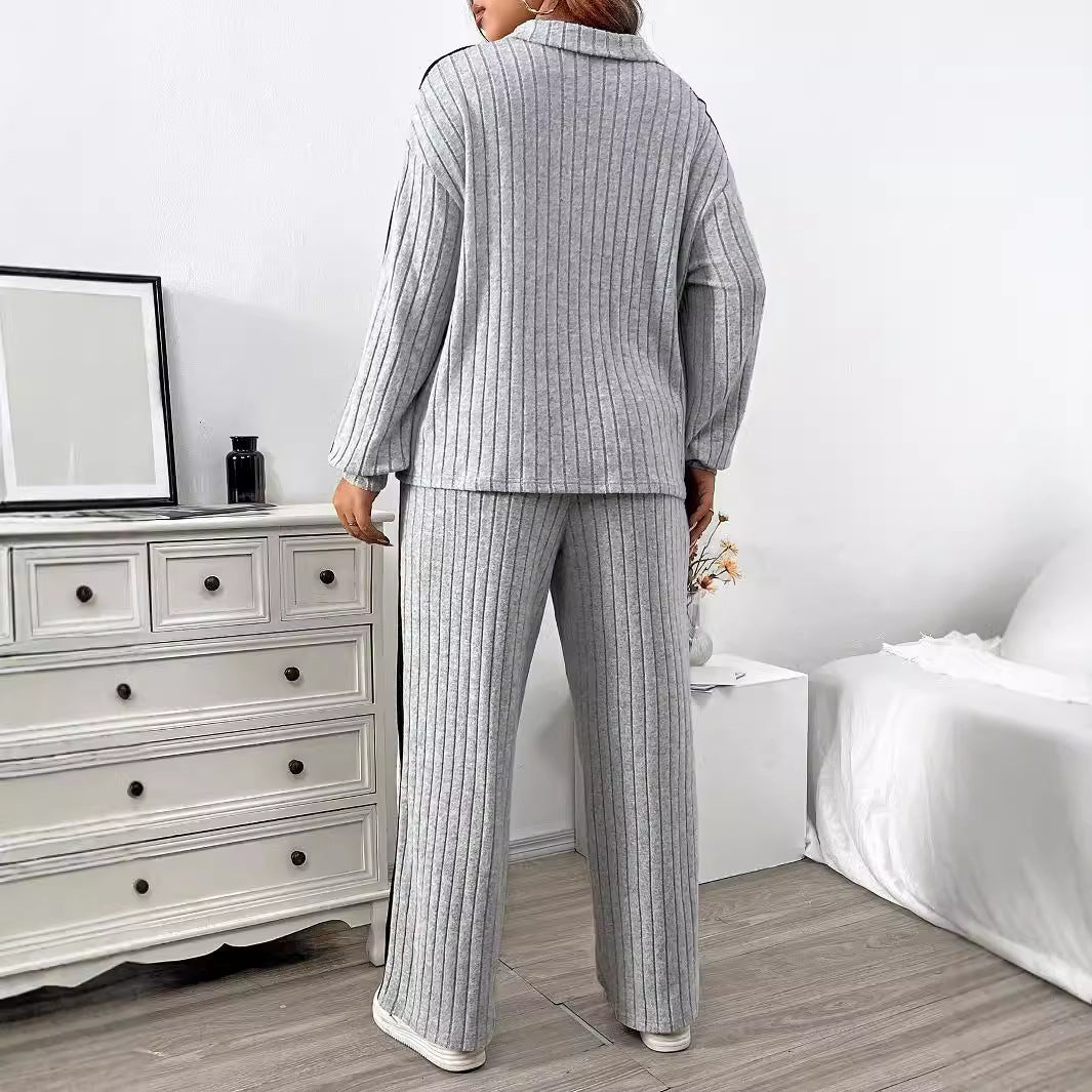 Dame elegant sportdragt med lynlås og stribet design Stilla