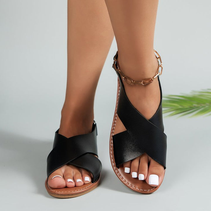 Dame halvsandaler med elegant krydsrem og skridsikker sål Stilla