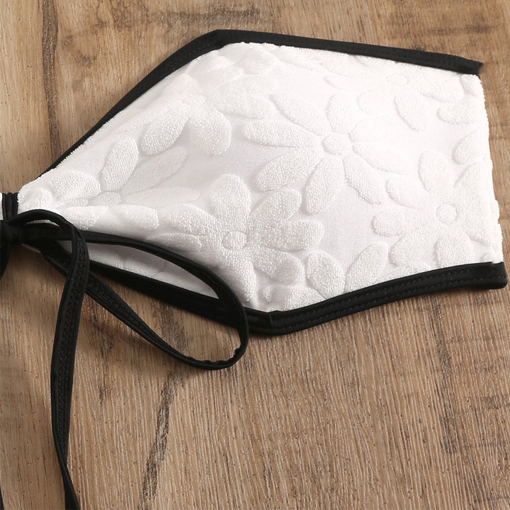Dame Bandeau-bikini med blomsterprint og dekorativ knude Stilla