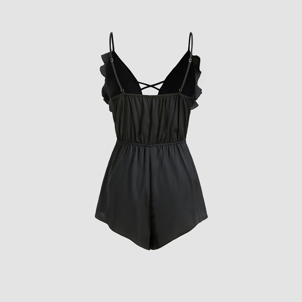 Dame jumpsuit med flæser og dyb V-hals Stilla