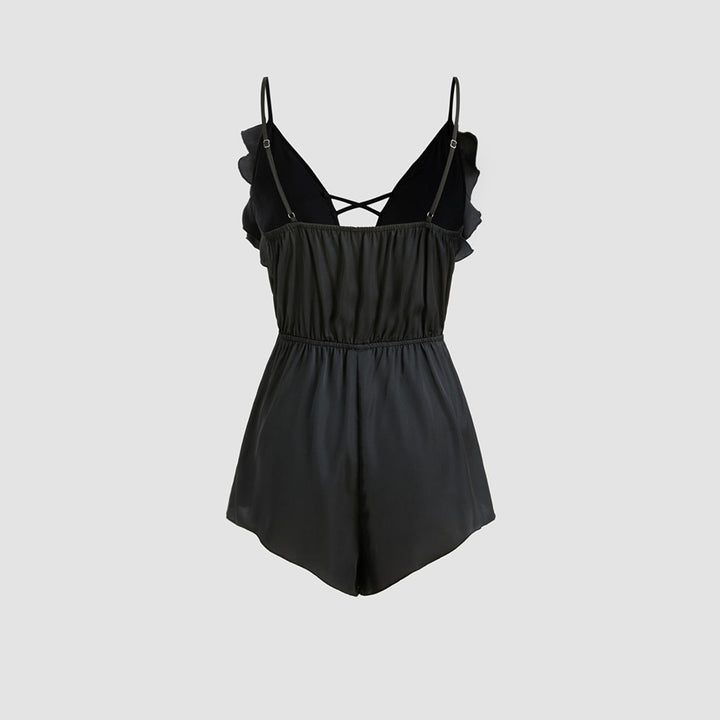 Dame jumpsuit med flæser og dyb V-hals Stilla