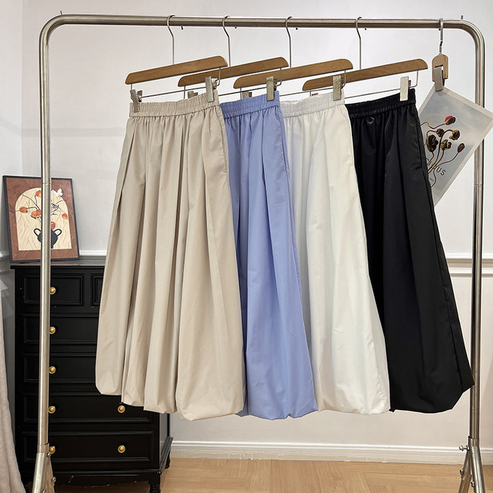 Kvinders elegante midi-nederdel med elastisk talje og voluminøs skæring Stilla