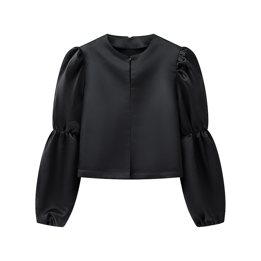 Kvindernes elegant skræddersyede blouse med voluminøse ærmer Stilla
