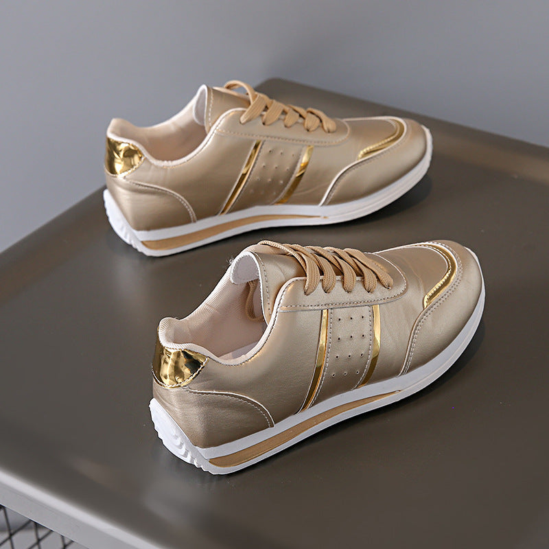 Dame mode Sneakers med bæredygtig skinnende overflade og åndbart mesh Stilla