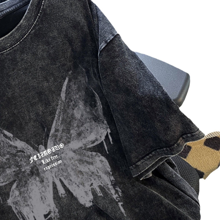 Dame Oversized T-shirt med kunstnerisk sommerfugledesign Stilla