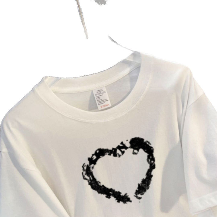 Dame T-shirt med kreativ hjerte-design og afslappet pasform Stilla