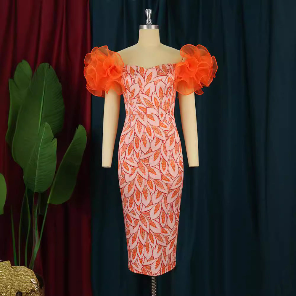 Dame Elegante Midi-Kjole med innovative puffærmer og kunstnerisk tryk Skovae
