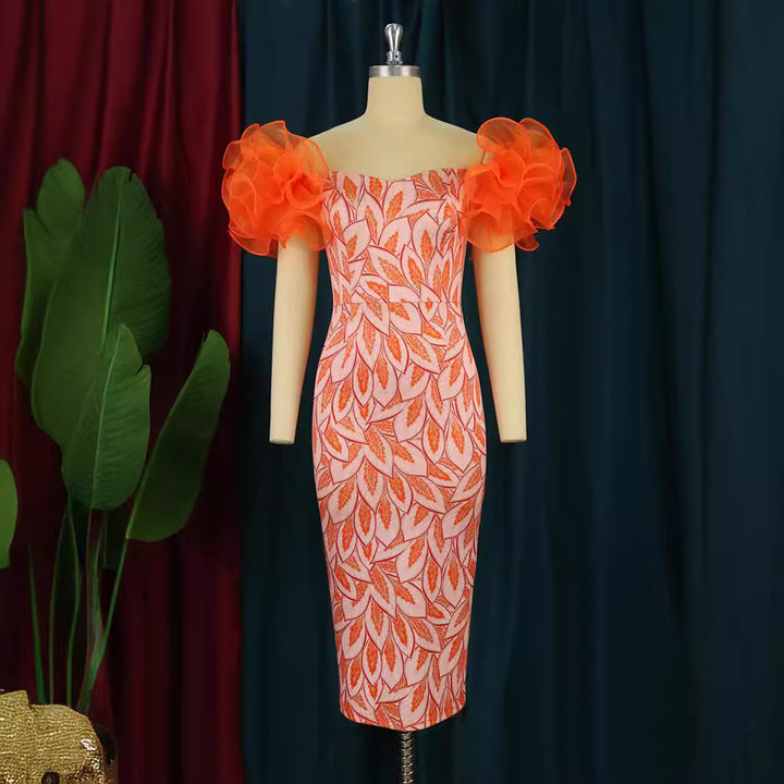Dame Elegante Midi-Kjole med innovative puffærmer og kunstnerisk tryk Skovae