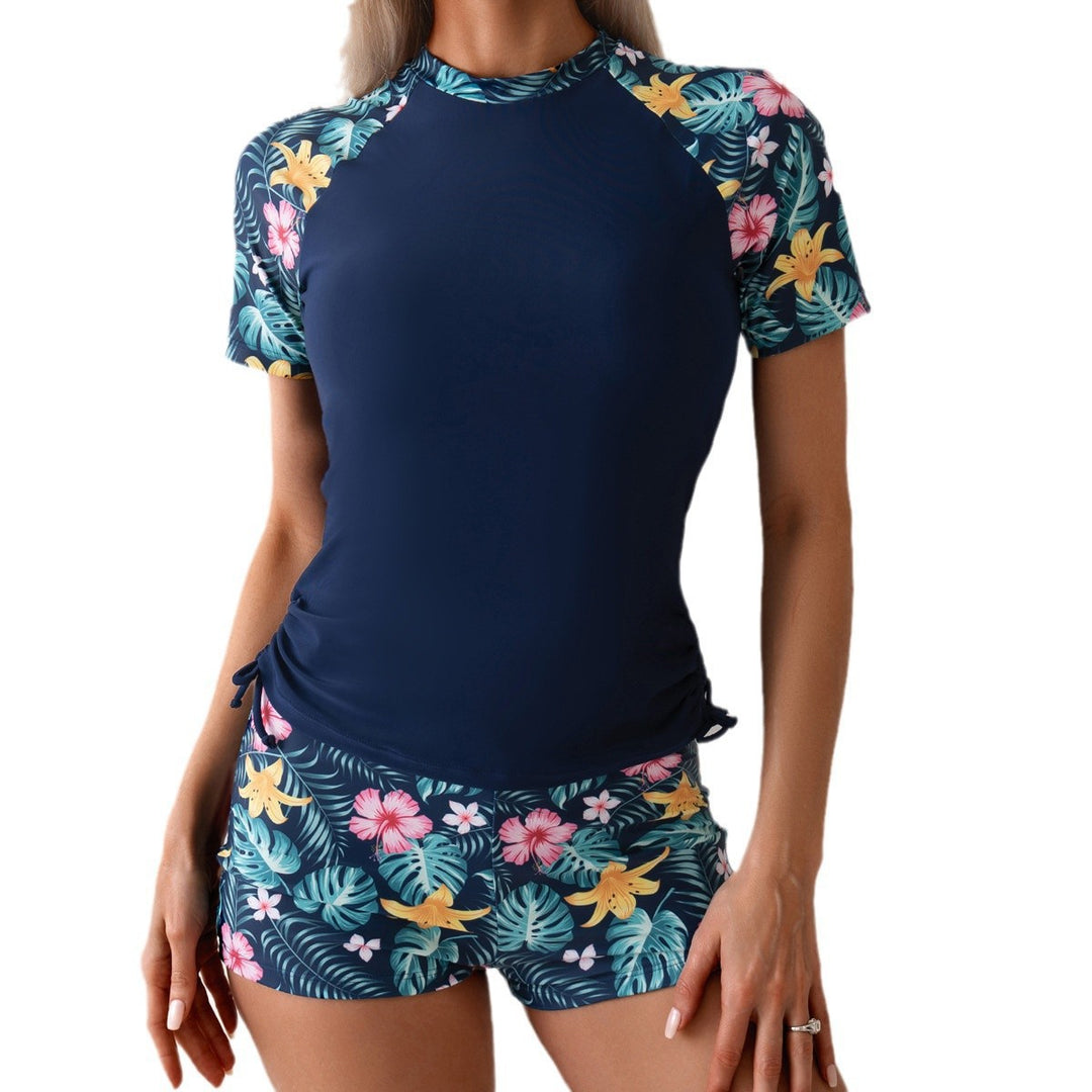 Dame surf- og sportsdragt med florale accenter Skovae