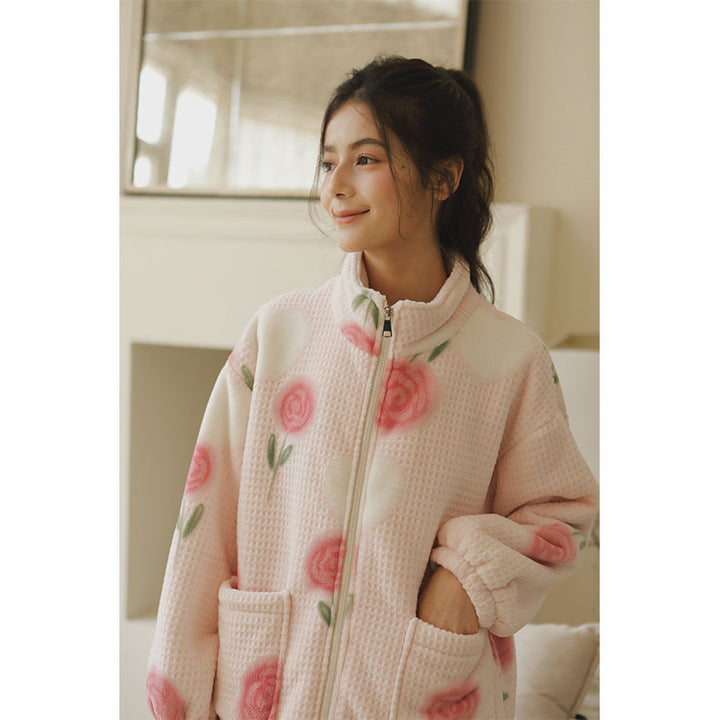 Dame Lækkert Fleece tæppe med blomstret design og praktiske lommer Stilla