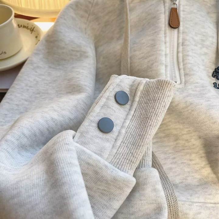 Dame hyggelig hættepullover med halv høj lynlås og kreativt motiv Stilla