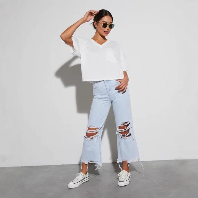 Dame Mom Jeans med frynset kant og ribbet detaljer Stilla